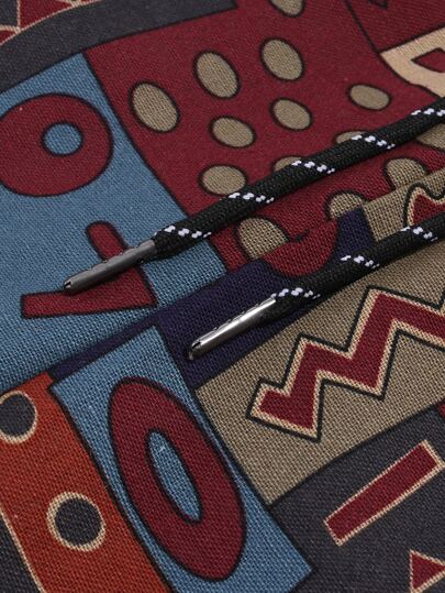 Manfinity Homme سروال رجالي فضفاض بتصميم هندسي عشوائي بجيوب جانبية، سروال فضفاض طويل مميز بألوان جريئة للخروج