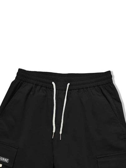 Manfinity EMRG سروال شحن رجالي بجيوب قطعة مطوية بشكل رسومات وخصر مرن برباط