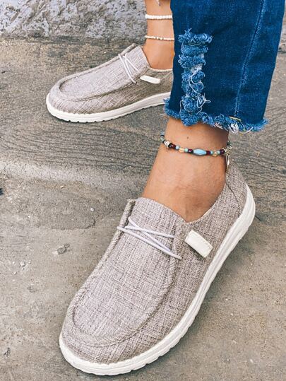 حذاء رياضي سهل الارتداء للنساء رمادي الموضة موحد اللون مع امامي ربطة عنق الى كاجوال ارتداء