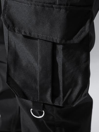 Manfinity Hypemode سروال رجالي واسع مريح بجيوب بطية ، خصر برباط جانبي، في اللون الأسود السادة الطويل الذهاب للخارجة