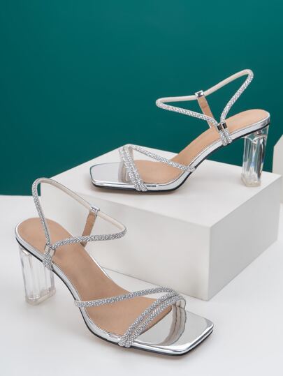 أحذية نسائية ذات كعب رفيع من الكعب العالي مزينة بنسيج معدني وبلّورات