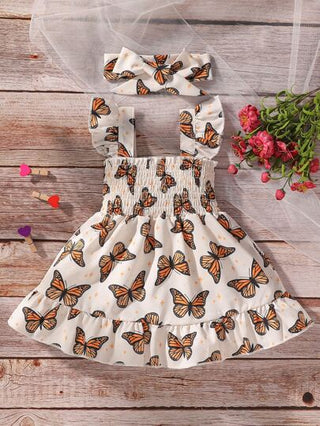 فساتين بيبي فستان طفلة بطبعة الفراشة وتفاصيل بالكشكشة ورباط عنق مع شريط للشعر
