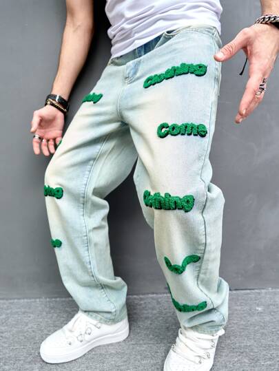 Manfinity EMRG جينز فضفاض للرجال بجيوب مائلة مع رقعة حرفية