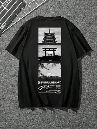 Manfinity Homme تي شيرت منخفض الاكتاف بطباعة شعار للرجال