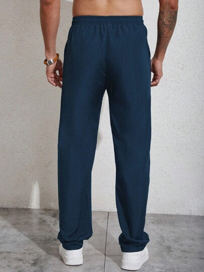 Manfinity Homme بنطلون تفاصيل مرقع بعبارة رباط خصر للرجال