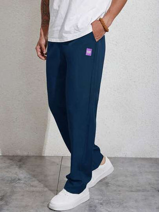 Manfinity Homme بنطلون تفاصيل مرقع بعبارة رباط خصر للرجال