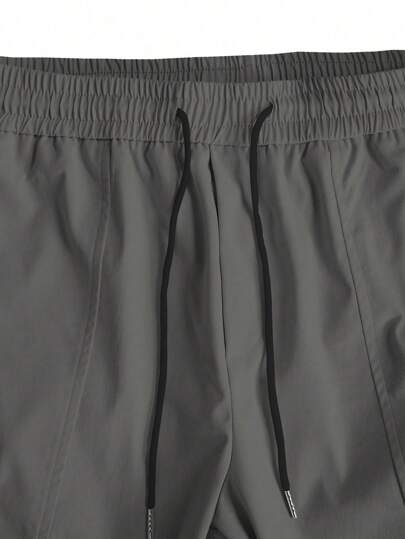 Manfinity LEGND بنطلون شحن رجالي فضفاض مع جيوب ذات حاجز، ياقة جانبية برباط