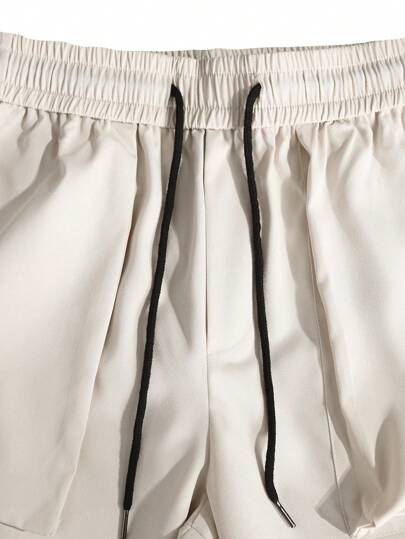 Manfinity EMRG بنطلون رجالي واسع الحجم فضفاض بجيوب جانبية وخصر مطاطي، بتصميم ضيق في الأسفل، مناسب للاستخدام خارج المنزل، هدية للزوج أو الحبيب