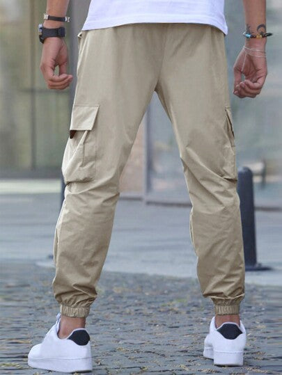 Manfinity Homme بنطال شحن رجالي فضفاض بجيوب تصميم الطية على الأجزاء، و خصر مع رباط