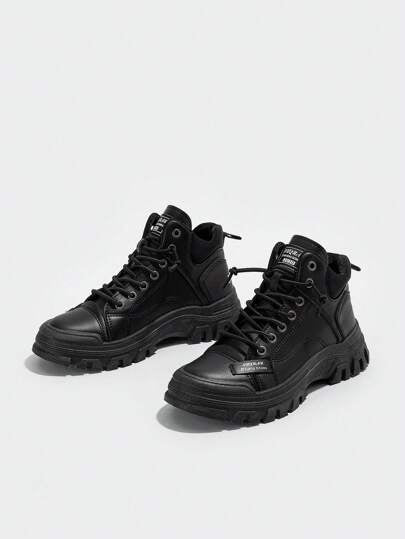 حذاء رياضي خارجي باصابع قدم دائري أسود رباط عالي القمة جلد نعل سميك مقاومة للاهتراء كاجوال