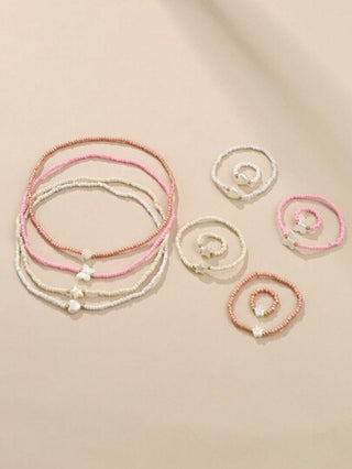 مجموعة عبارة عن 12 قطعة: 1-عقد مجوهرات مطرز / 2- 4أساور / 3- 4خواتم / 4- 4زينات يومية للفتيات