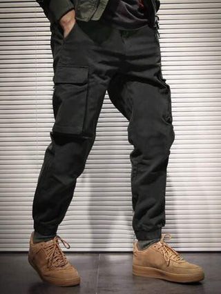 Manfinity Hypemode بنطلونات كارجو واسعة للرجال مع جيوب متعددة