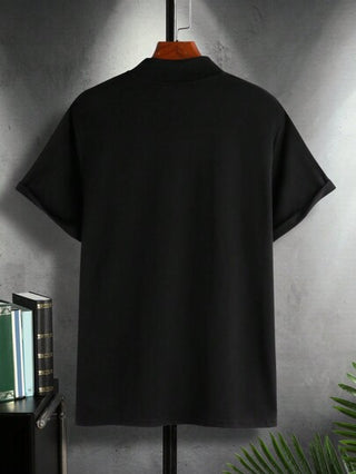 Manfinity Homme تيشيرت رجالي أسود فضفاض بطباعة حرفية