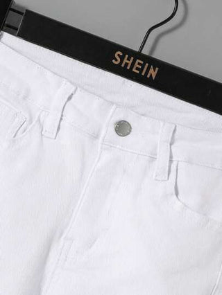 SHEIN بنطلون جينز للأولاد في مرحلة المراهقة مع تفاصيل ممزقة