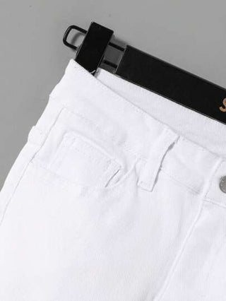 SHEIN بنطلون جينز للأولاد في مرحلة المراهقة مع تفاصيل ممزقة