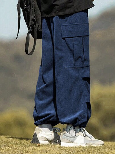 Manfinity Hypemode سروال رجالي بالقماش الكردي الواسع بجيوب