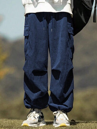 Manfinity Hypemode سروال رجالي بالقماش الكردي الواسع بجيوب