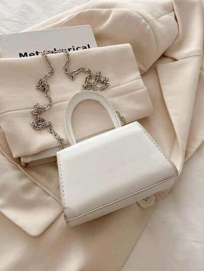 قطعة واحدة من حقيبة يد الأطفال المصنوعة من البولي يوريثان بلون سادة مع عقدة على شكل فيونكة بسيطة وعصرية، وحقيبة كروس وحقيبة حمل