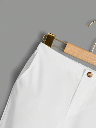 SHEIN بنطلون صبي شاب عصري بجيوب مائلة بلون ثابت عارضة