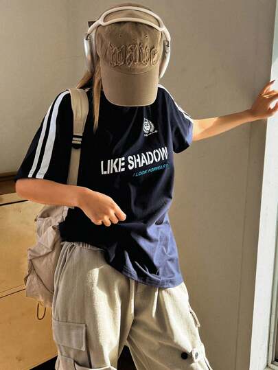 DAZY تي شيرت رياضي نسائي بطبعات خطوط وألوان متباينة ورسومات حرفية من أكمام طويلة وقصيرة وياقة دائرية