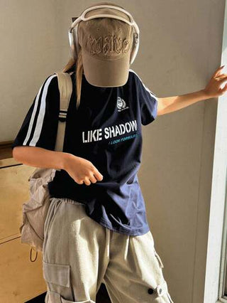 DAZY تي شيرت رياضي نسائي بطبعات خطوط وألوان متباينة ورسومات حرفية من أكمام طويلة وقصيرة وياقة دائرية