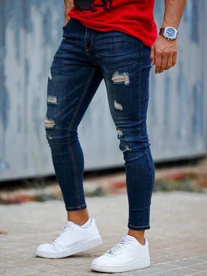 بنطلون رجالي جينز أزرق ضيق ممزق