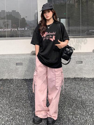 DAZY تي شيرت نسائي قصير الأكمام رقبة دائرية فضفاض بطباعة شعار وأنماط فراشات، صيفي بتصميم كبير الحجم