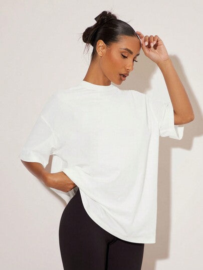 BASICS قميص نسائي فضفاض بتصميم الكتف المنخفض لون سادة للارتداء العارض