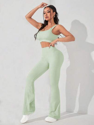 SHEIN Sport Studio طقم بنطلون وصدرية رياضية صلبة للنساء