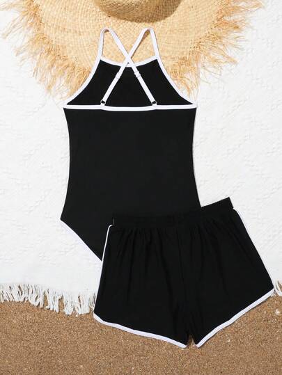 مايوه كامل لفتيات المرحلة الانتقالية بطبعة حرف وتصميم بلوكات ألوان وحواف