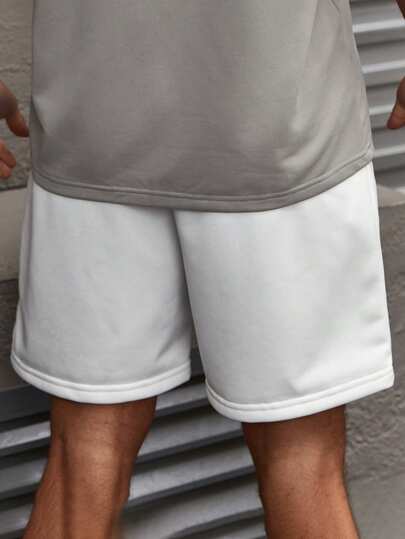 Manfinity RelaxMax قصير شاطئي نسائي أحادي اللون مزود بحزام سحاب ومرون، ذو جيوب مائلة، لون أبيض عادي مناسب للمتزوجين وخطباء كهدايا، قصير أبيض للرجال