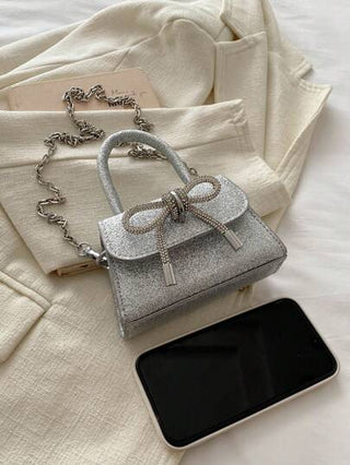 حقيبة يد إطفال بو بسيطة بلون سادة مع تفاصيل عقدة، أنيقة وعصرية كحقيبة يد أو كتحمل على الكتف