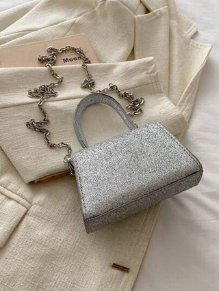 حقيبة يد إطفال بو بسيطة بلون سادة مع تفاصيل عقدة، أنيقة وعصرية كحقيبة يد أو كتحمل على الكتف