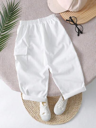 SHEIN بنطلون صبي رياضي بخصر مرن ولون سادة مع جيوب مناسب لفصلي الربيع والصيف