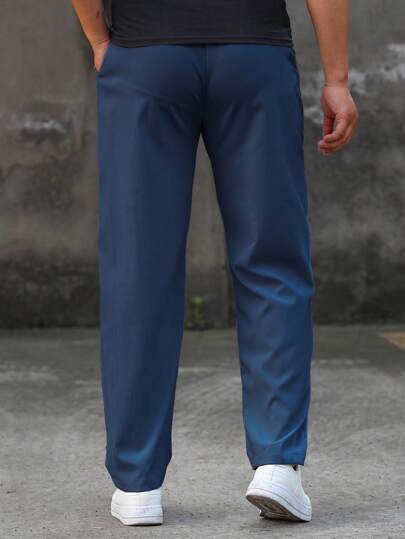 Manfinity Homme بنطلون رجالي مريح بقصة مستقيمة وتصميم جيوب بقطع حروف وخصر برباط