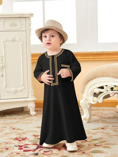 SHEIN جلابية تقليدية للأولاد الرضع بحافة ذهبية ومفتوحة من الأمام