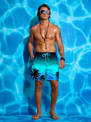 Manfinity Swimmode شورت شاطئ للرجال مطبوع عليه أشجار النخيل، أسلوب هاواي