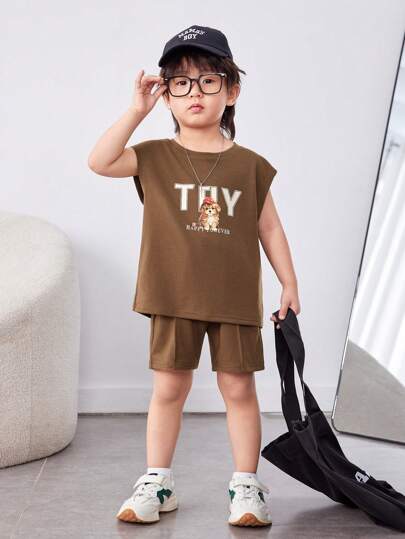 مجموعة طفل صبي شبه رسمية بتصميم كوري بطباعة حيوانات وحروف وبلوزة بدون أكمام، شورت بلون سادة، 2 قطعة من الصوف مع جيوب