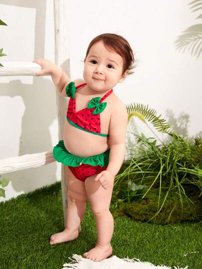 ملابس سباحة مطبوعة بنمط البطيخ وزينت بعقدة للرضعة البناتية