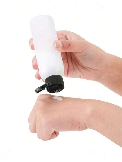 5 قطع زجاجات كتف دائرية شفافة سعة 100 مل مزودة بغطاء قابل للطي على شكل فراشة، أوعية سفر فارغة للعينات الجمالية،زجاجات للأغراض المنزلية والسفر مقاومة للتسرب بغطاء أسود قابل للطي لمستحضرات التجميل والشامبو والكريمات وأغراض السفر والطول 30مل/50 مل/80...