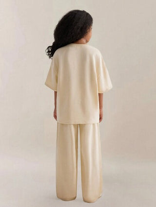 girls-sets تي شيرت قصير الأكمام الواسع الملمس الصلب للفتاة المراهقة المحبوك الذي يتميز بالكتفين المنخفضين مع بنطلون برباط وجيوب مائلة، مجموعة مكونة من قطعتين