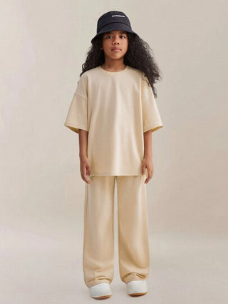 girls-sets تي شيرت قصير الأكمام الواسع الملمس الصلب للفتاة المراهقة المحبوك الذي يتميز بالكتفين المنخفضين مع بنطلون برباط وجيوب مائلة، مجموعة مكونة من قطعتين