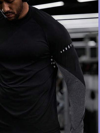 Manfinity Sport Corelite تي شيرت رياضي طويل الأكمام بأكمام ملونة وسحاب للرجال بطراز صديق