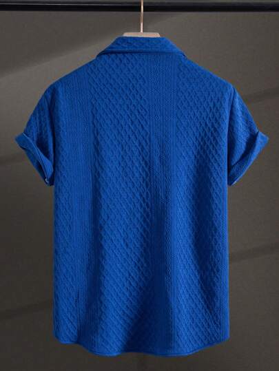 Manfinity Homme قميص صيفي بأكمام قصيرة ولون سادة للرجال