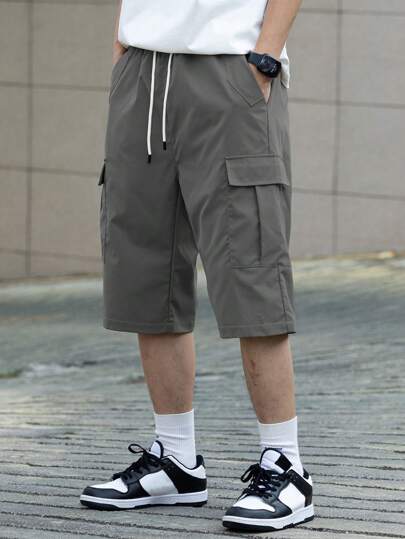 Manfinity EMRG شورت رجالي بخصر مطاطي برباط لون سادة عرضي لربيع وصيف