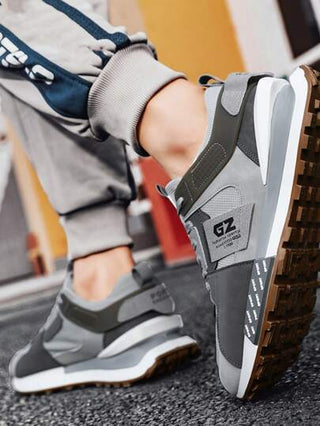 حذاء رياضي رجالي بكتلة لون سميك الأسطح، أنيق ومتنفس ومريح وبرباط تزيد ارتفاعه، للاستخدام الرياضي والهواء الطلق