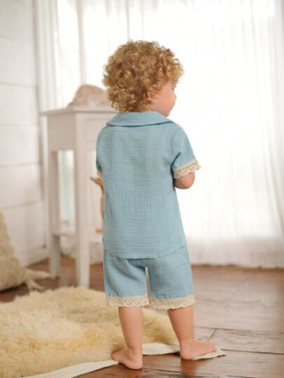 SHEIN طقم ملابس منزلية كاجوال مكون من قطعتين، شورت قصير الأكمام بلون أزرق بحيرة بسيط للفتيات الصغيرات