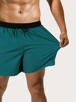 Manfinity Swimmode شورت شاطئ ذو خصر مربوط بسير بالألوان المركبة للرجال، هاواي