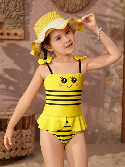 مايوه قطعة واحدة للفتاة الصغيرة مطبوع عليه رسوم كرتونية جذابة ومخططة بتفصيلة عقدة زخرفية