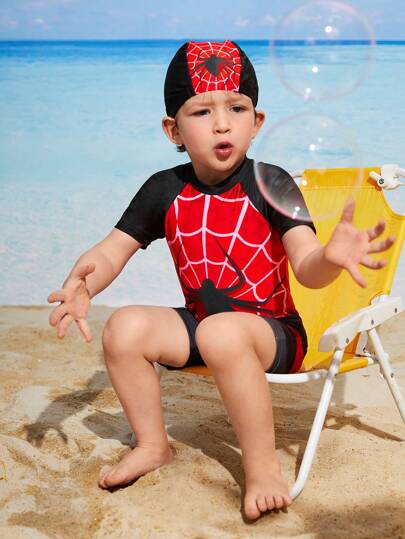SHEIN طقم بدلة سباحة / غطاء سباحة قصير الأكمام بطبعة العنكبوت الفاشن للفتى الصغير